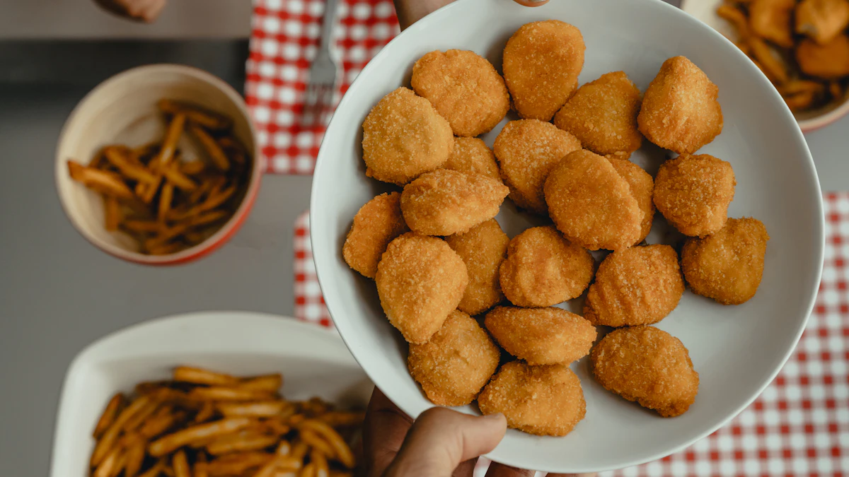 Chicken nuggets with fries — illustrative photo